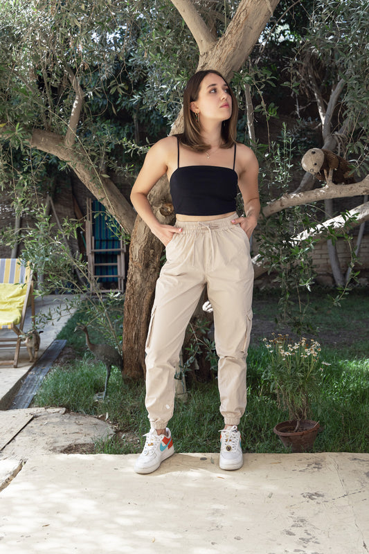 Beige cargo and black top